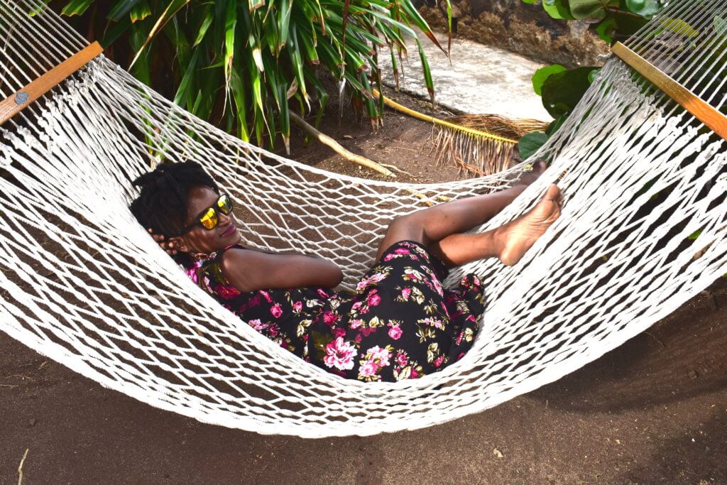 last-minute-vacation-hammock-lying-on-hmmock-flower-caribbean-blackgirl