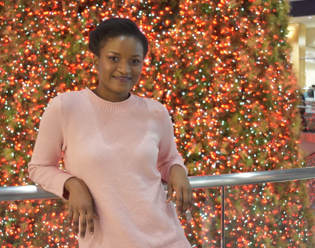 cf-toronto-eaton-center-christmas-tree-light-pink-sweater-pretty-black-girl