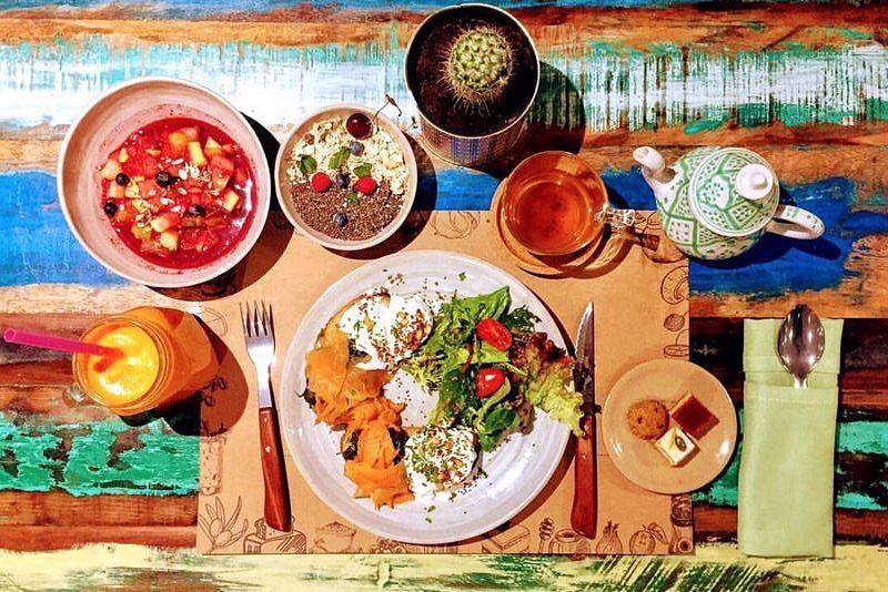 things-to-do-in-casablanca-moroccan-food-laid-down-on-table-colorful-plates