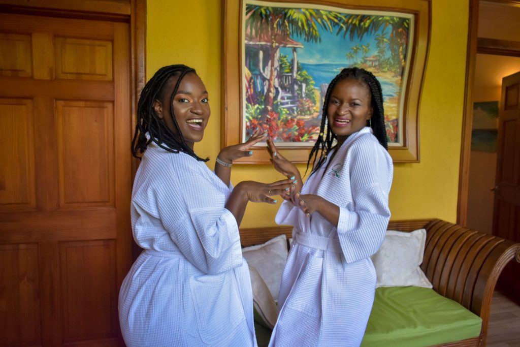 Black female travelers at Caribbean resort, on Spa Day 