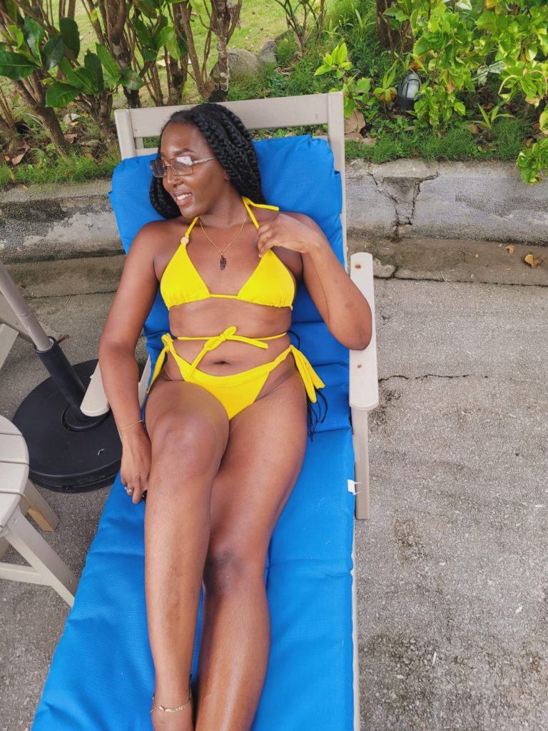 Posing at the pool during a baecation at a luxury Caribbean eco-resort