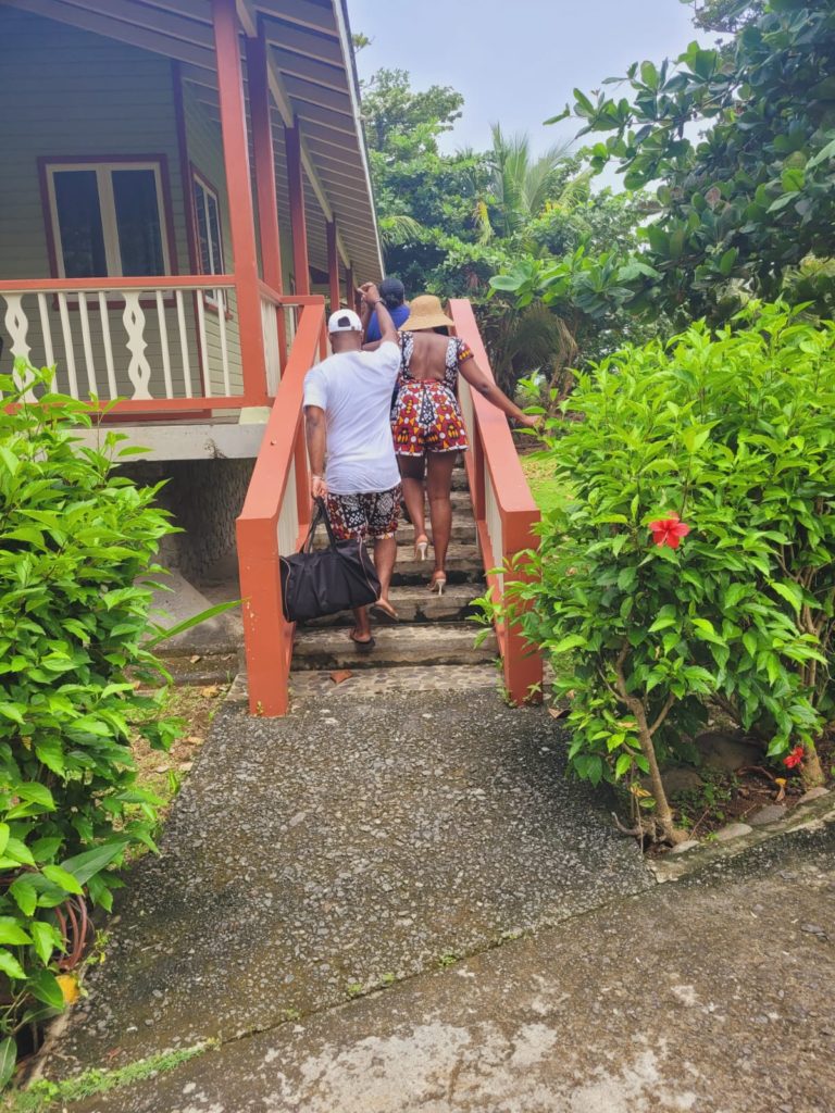 Caribbean couple with bogolan red ankara print at a luxury resort in the Caribbean, Rosalie Bay Dominica2