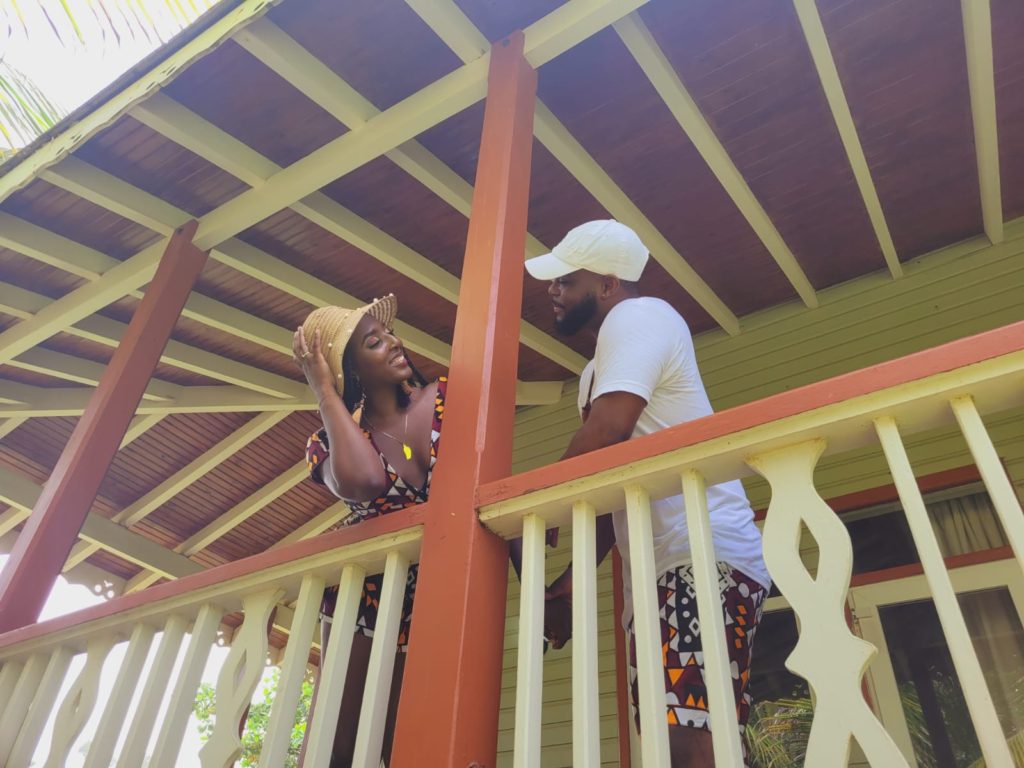 Caribbean couple with bogolan red ankara print at a luxury Caribbean eco resort - Rosalie Bay Dominica 