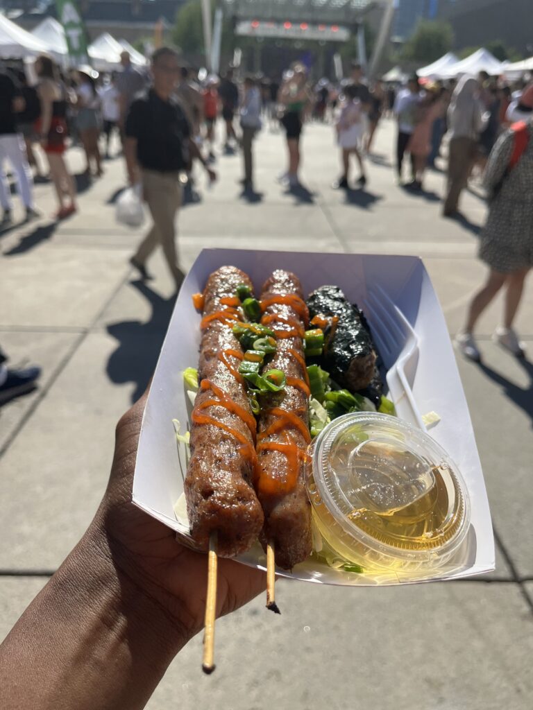 festivals in toronto - trying vietnamese traditional food at the taste of vietnam festival at nathan philip square in Toronto