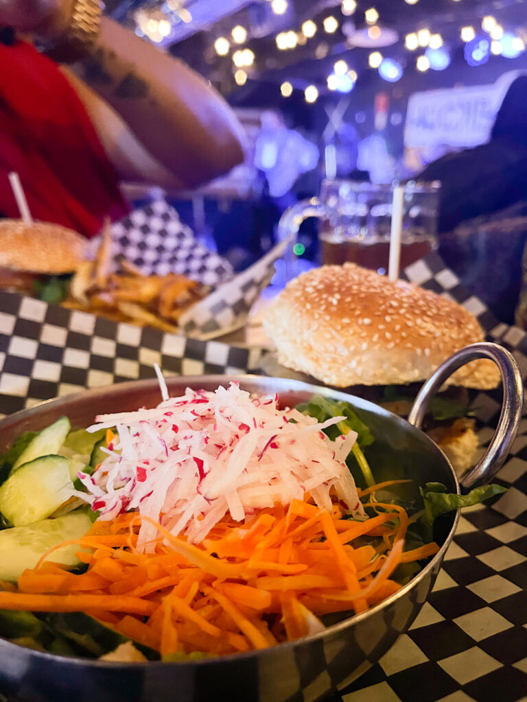 Burger and salad at the Loose Moose Bar and Restaurant in Toronto