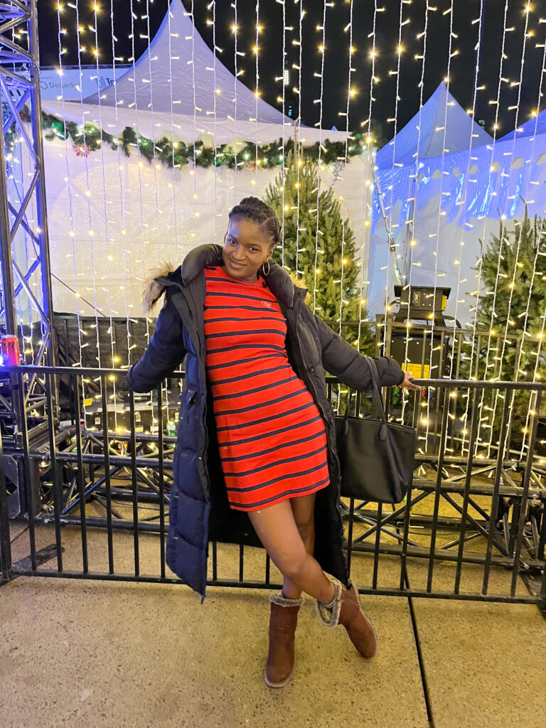 Christmas lights Toronto - posing in a red Tommy Hilfiger Dress at the Nathan Phillip Fair in the Square, black girl
