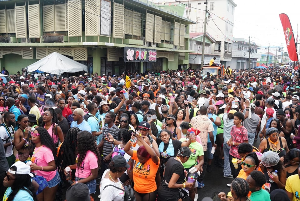 Jouvert morning crowd dancing in Dominica on Carnival monday, Caribbean Carnival experience - Dominica Carnival 