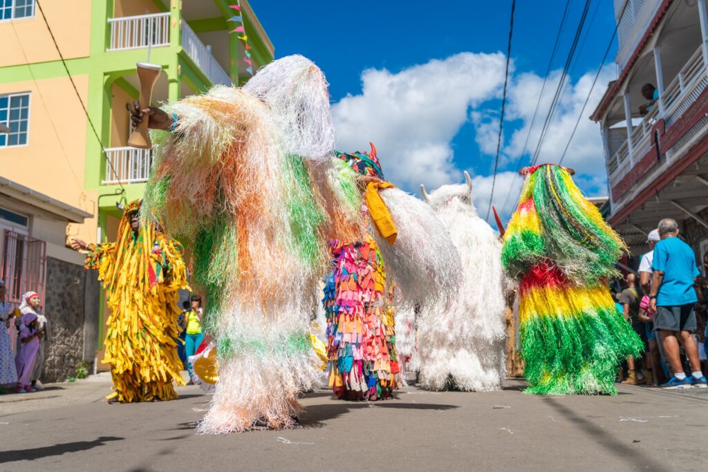 Traditional sensay in Dominica made of rice bag shredding, parading during the Jouvert morning - Caribbean Carnival 