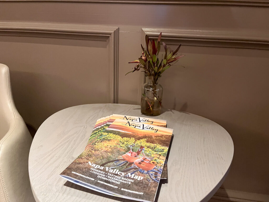 A magazine about Napa Valley Map: showcasing all the best things to do in Napa and places to stay downtown Napa, placed on a lobby table at the River Terrace Inn downtown Napa