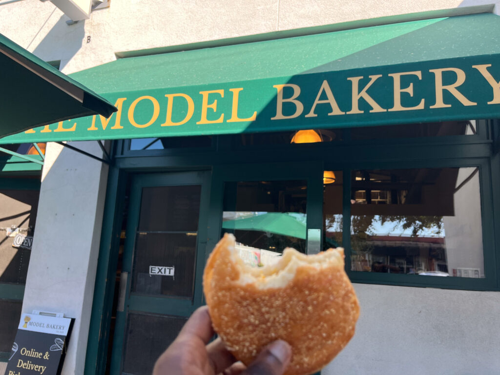 Holding a freshly baked English muffin at the Model Bakery, one of Oprah Winfrey's favourite things - Restaurant downtown Napa