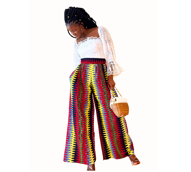 Black african girl wearing a Ngaska African style Palazzo pants - Travel with Clem