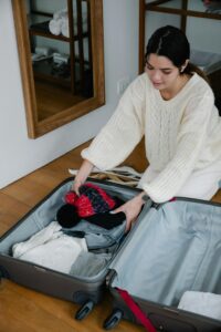 woman packing a suitcase