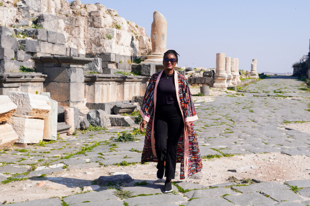 Travel with Clem, exploring Umm Qais in Jordan during a local tour