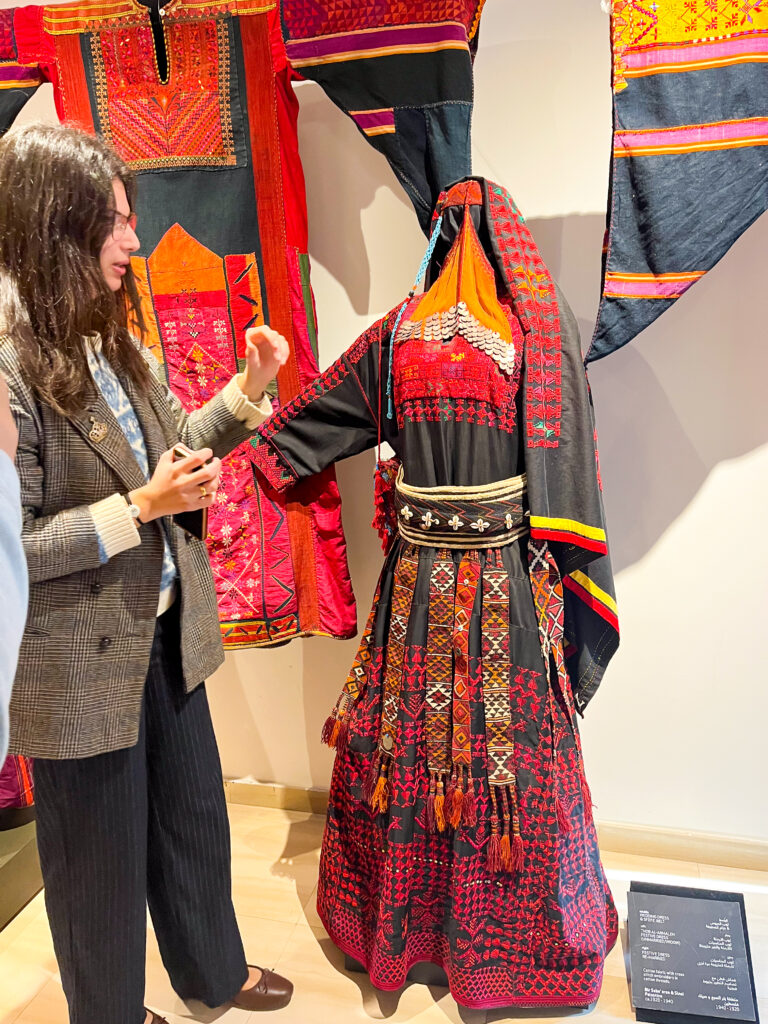 Jordan traditional clothing -  the Tiraz museum manager describing the different styles of levantine clothing for women: Jordan, Syria and Palestine
