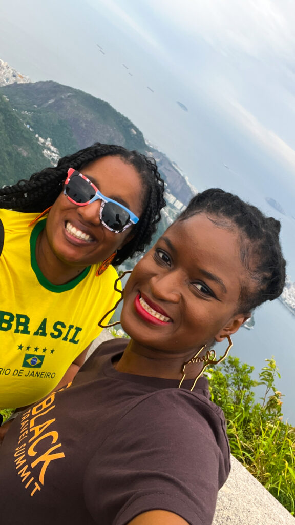 Visiting Christ the Redeemer Brazil - Two black women taking a selfie 